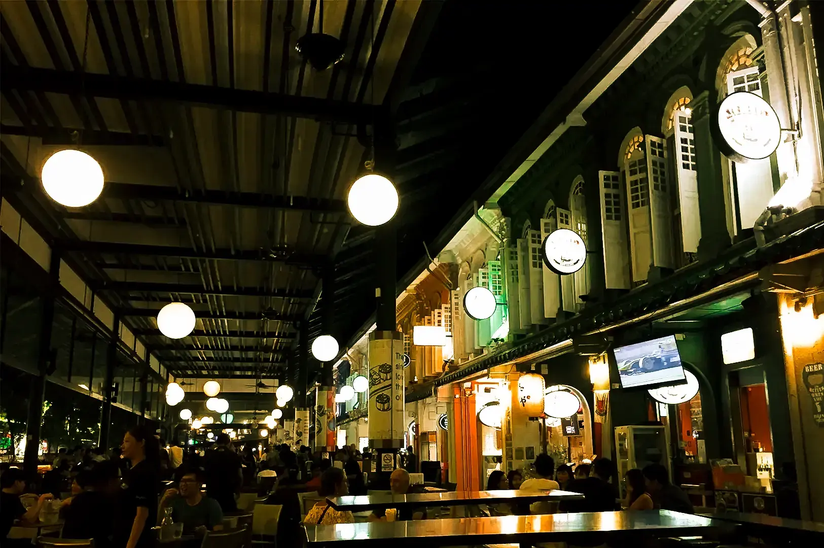 6ix 6ix exterior area with warm lights during night.