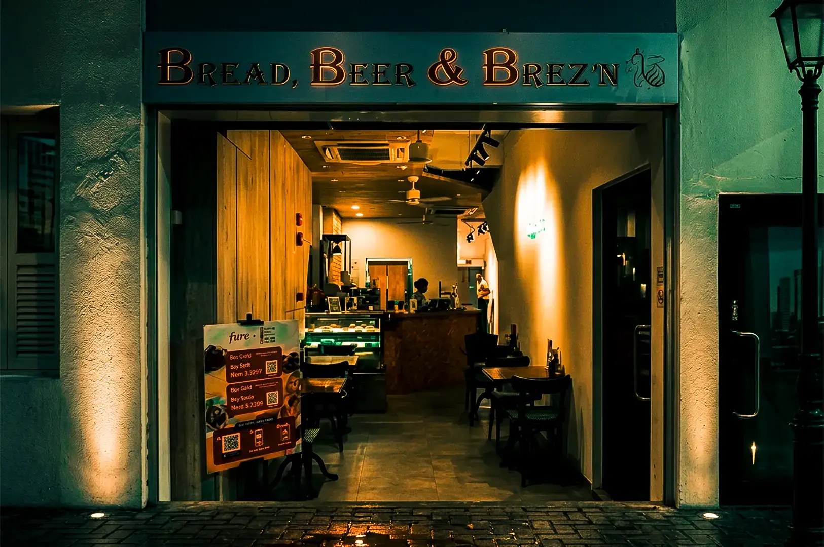 Bread, Beer & Brez’n storefront on Killiney Road, showing the bakery-cafe and outdoor beer garden.