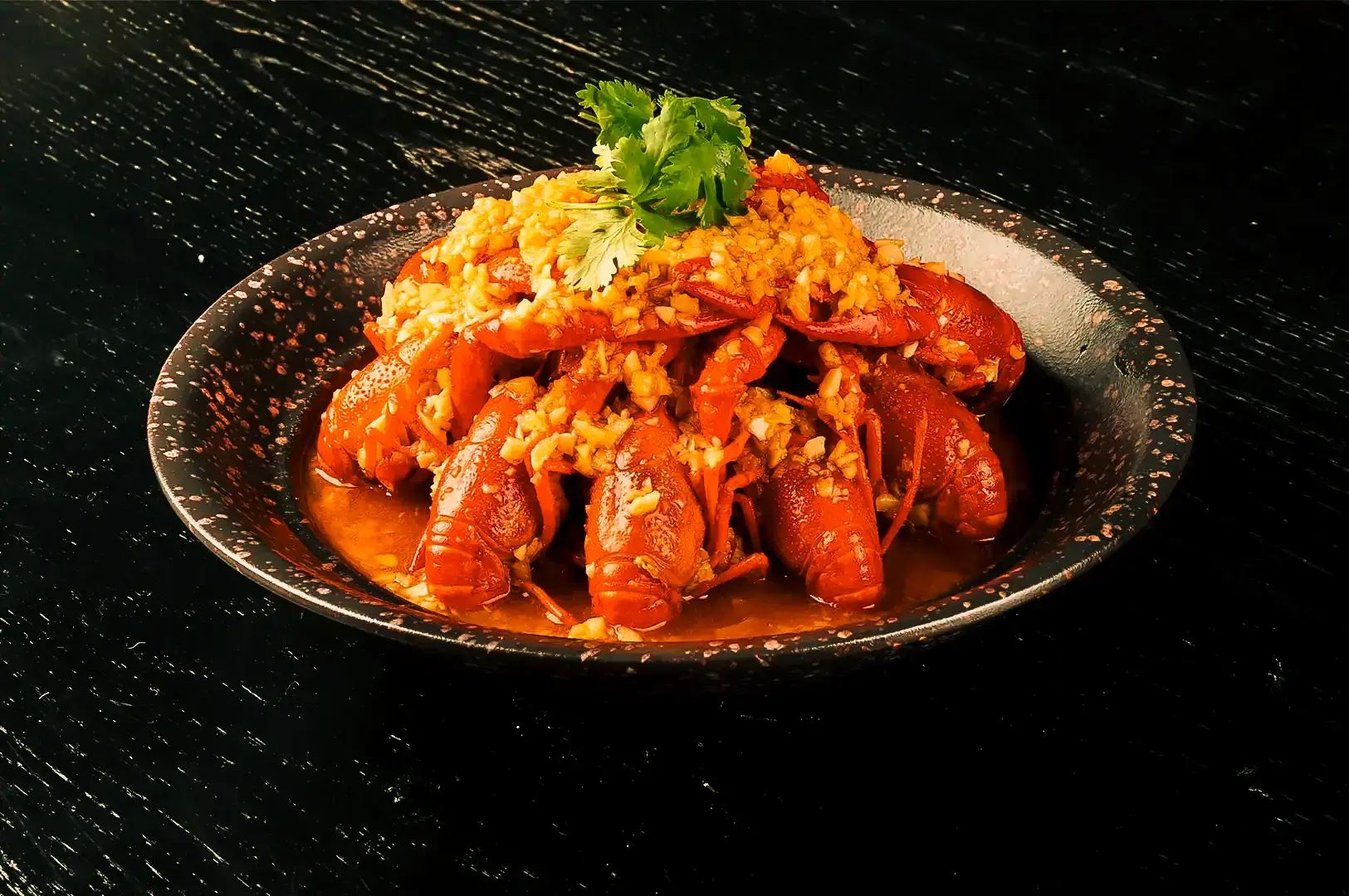 Spicy crawfish dish coated in garlic and spicy sauce served at 6ix 6ix, Cuppage Road.